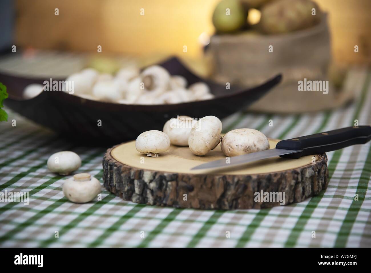 Fresh champignon mushroom vegetable in the kitchen - fresh mushroom vegetable cooking concept Stock Photo