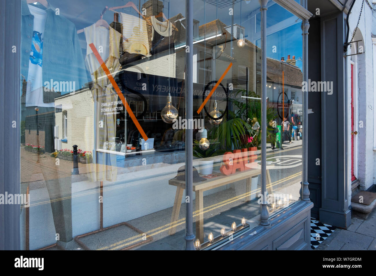 Clothes shop with a sale on in Whitstable, Kent, UK Stock Photo Alamy