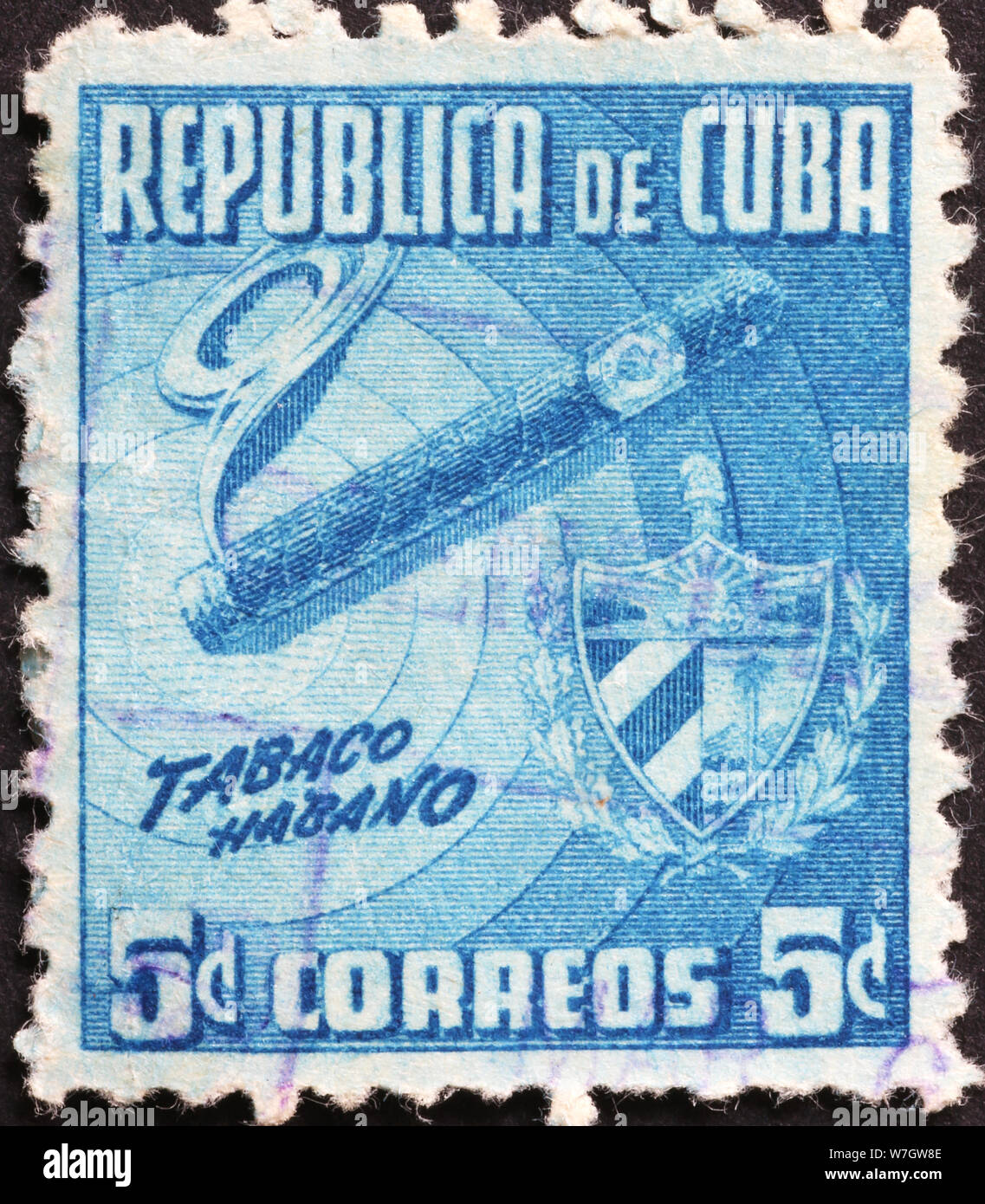 Cigar on old cuban postage stamp Stock Photo