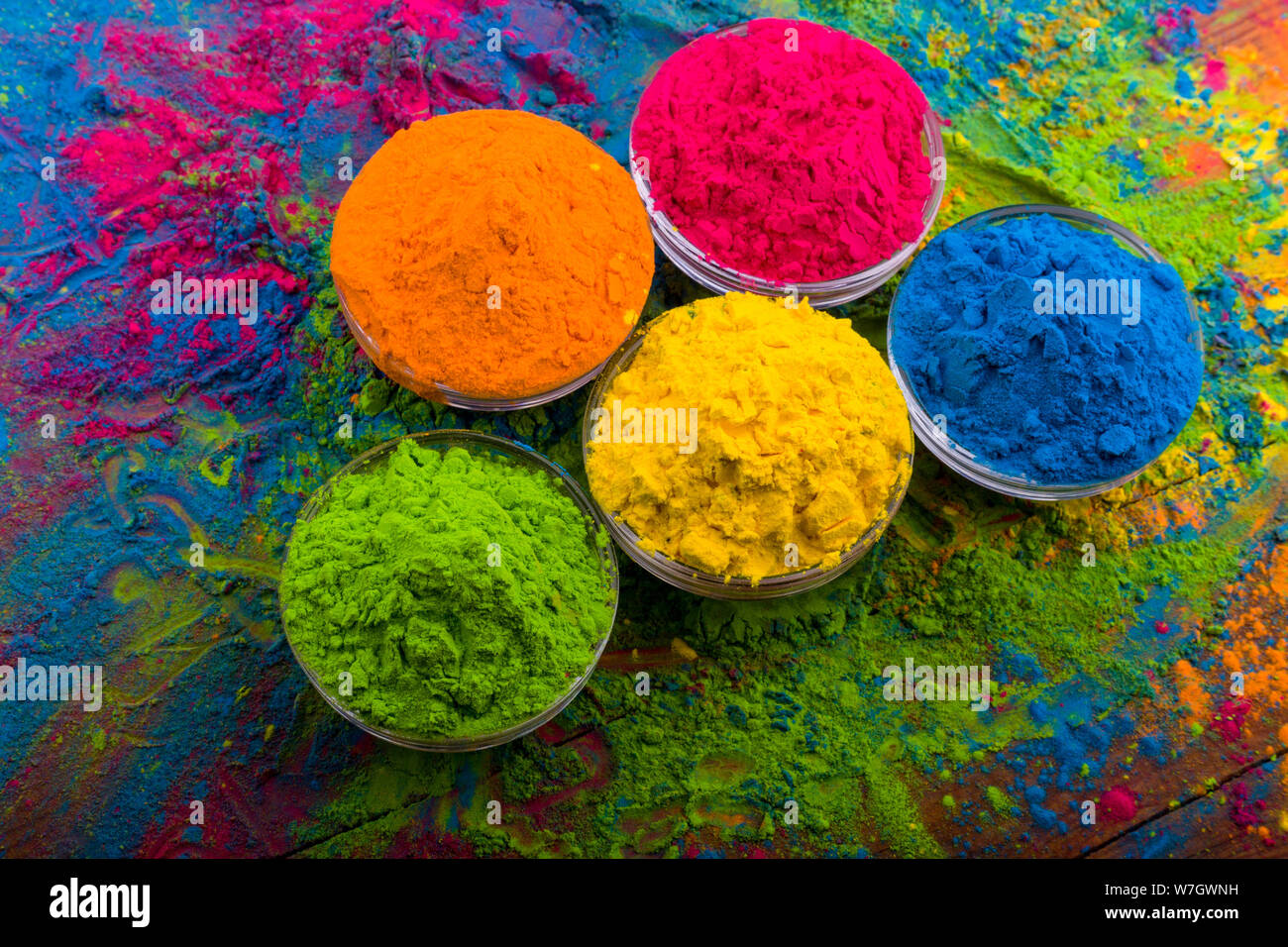 Holi color powder. Organic Gulal colours in bowl for Holi festival