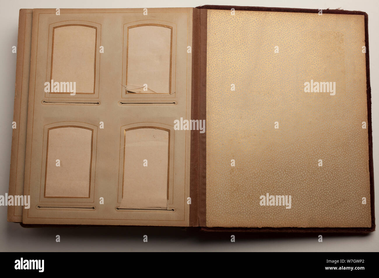 Beautiful end paper of an old photographic album with empty windows for prints. Stock Photo