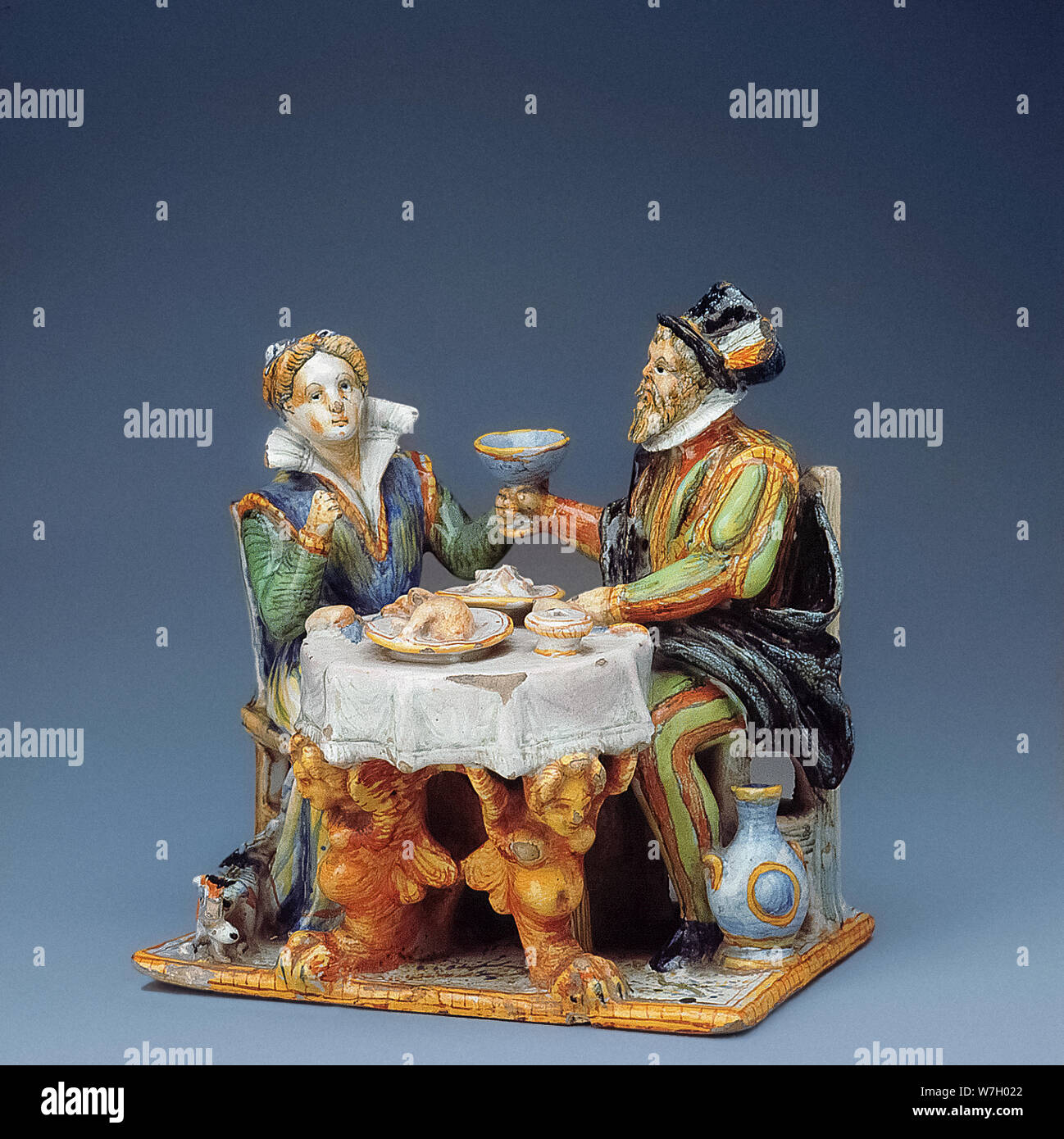 Italy Marche Pesaro Civic Museum - Patanazzi laboratory “Gruppo Plastico con due personaggi a tavola ” ( Plastic group with two characters at the table ) - late 16th-early 17th century Majolica painted in polychrome, Stock Photo