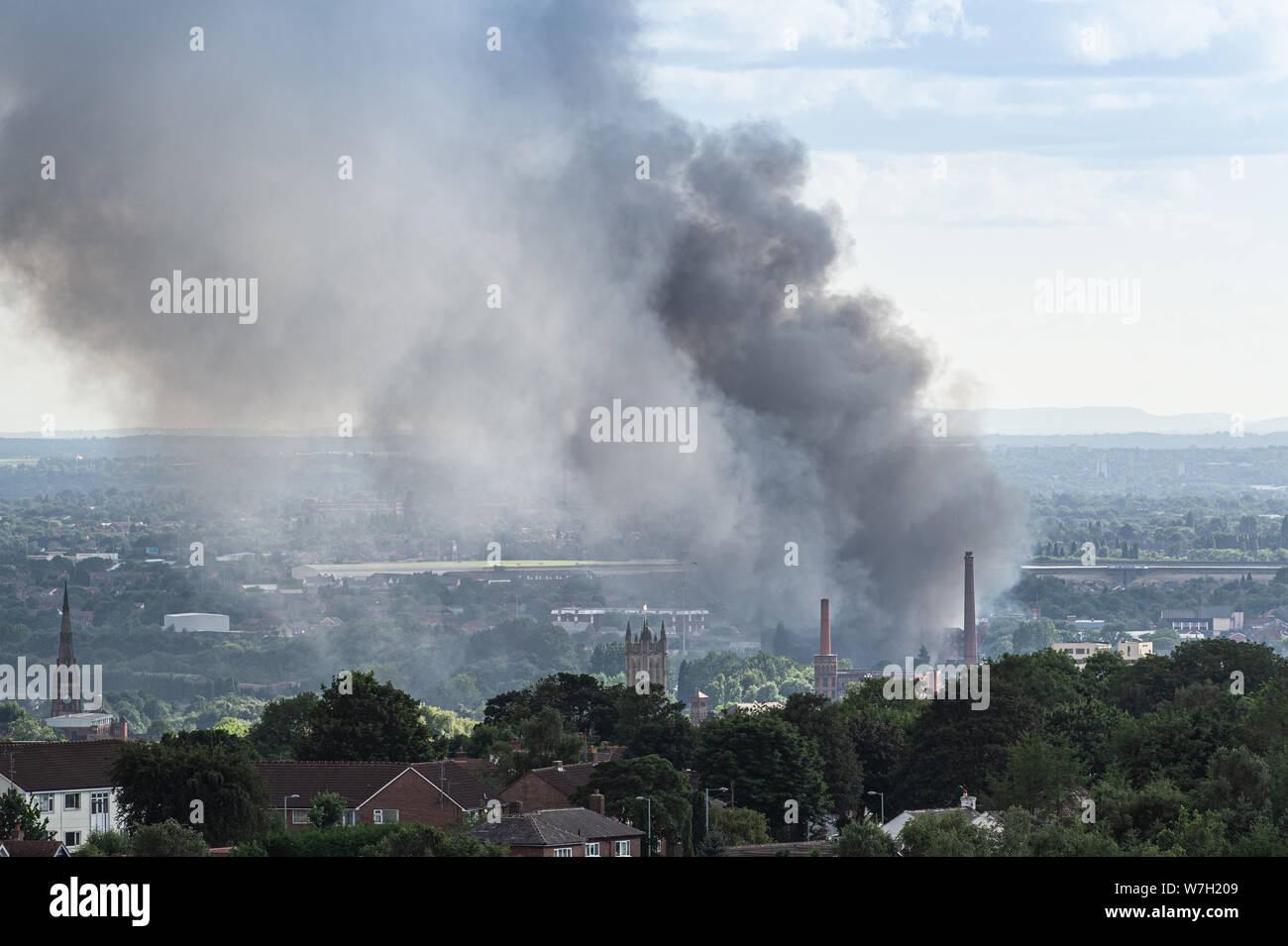 A large fire in progress on industrial units on Oxford Street East in the centre of the town of Ashton-under-Lyne, Tameside, Greater Manchester. Great Stock Photo