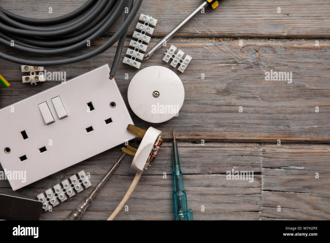 Electrical tools and equipment on a wooden background Stock Photo Alamy