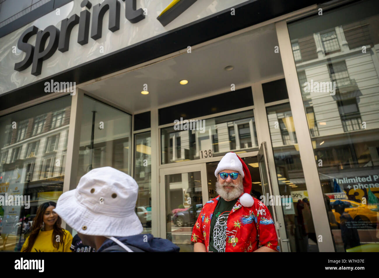 A Sprint store in the Herald Square neighborhood in New York during a promotional event on Saturday, July 27, 2019. The merger between Sprint and T-Mobile has been approved by the US Dept. of Justice.  (© Richard B. Levine) Stock Photo