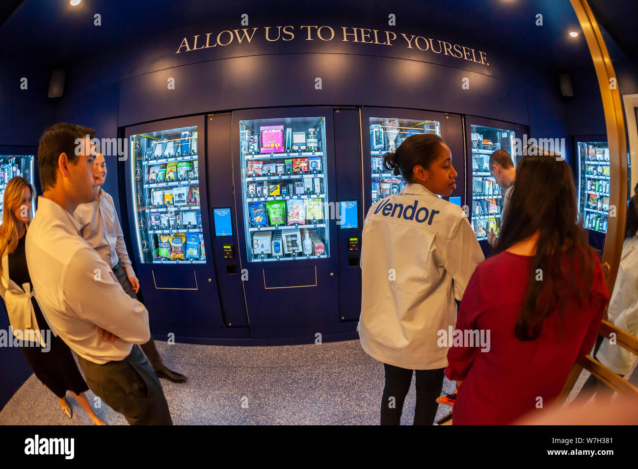 “The Vend” in Rockefeller Center in New York on its opening day, Tuesday, July 30, 2019. A product of Tishman-Speyer, the owners of Rockefeller Center, “The Vend”, installed in a vacant storefront on The Concourse, contains multiple vending machines selling everything from drinks, to Brooks Brothers shirts to a diamond engagement ring. (© Richard B. Levine) Stock Photo