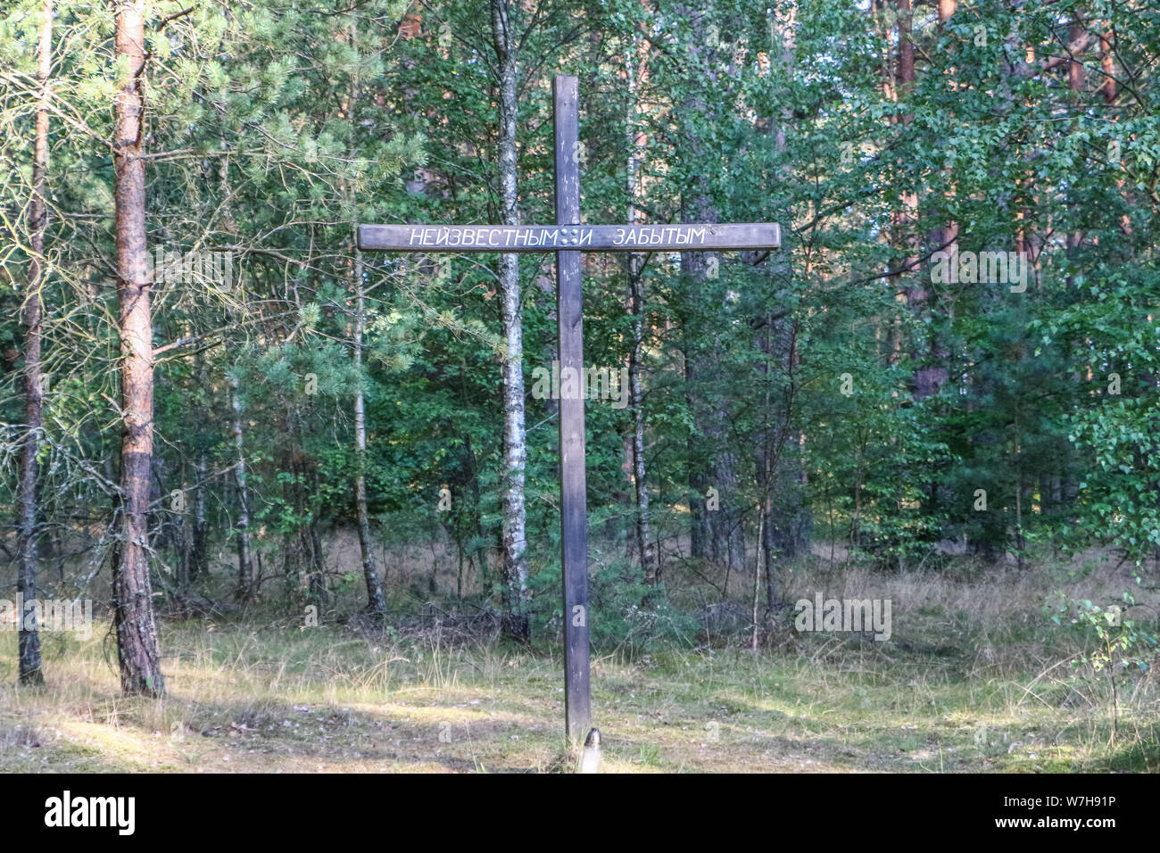 Borne Sulinowo, Poland. 3rd, August  2019 Cross with inscription that says - For unknown and forgotten  - is seen in Borne Sulinowo, Poland on 3 August 2019 Oflag II-D was a WWII German prisoner-of-war camp located at Gross Born was established to house French officers from the Battle of France, later Polish and Soviet soldiers. In Ja. 1945 there were 5,014 officers and 377 orderlies in the camp. © Vadim Pacajev / Alamy Live News Stock Photo