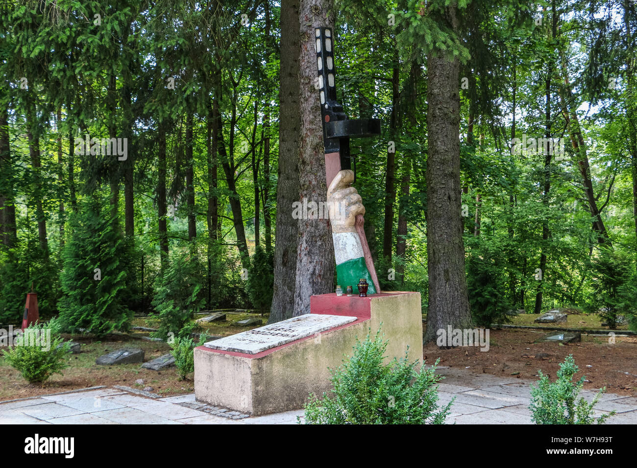 Borne Sulinowo, Poland. 3rd, August  2019 Monument of the Ivan Poddubny - A hand with a PPSh-41 Russian Soviet submachine gun on the North Group of Force Soviet Russian army are seen in Borne Sulinowo, Poland on 3 August 2019 Borne Sulinowo between 1945 and 1992 was a secret Soviet military base, erased from all Polish maps and it was not transferred to Polish jurisdiction until 1992. In official documents were called forest areas and remained a secret for almost 50 years. In 344 graves are buried Soviet soldiers, their families and civilian soviet army workers. © Vadim Pacajev / Alamy Live Ne Stock Photo