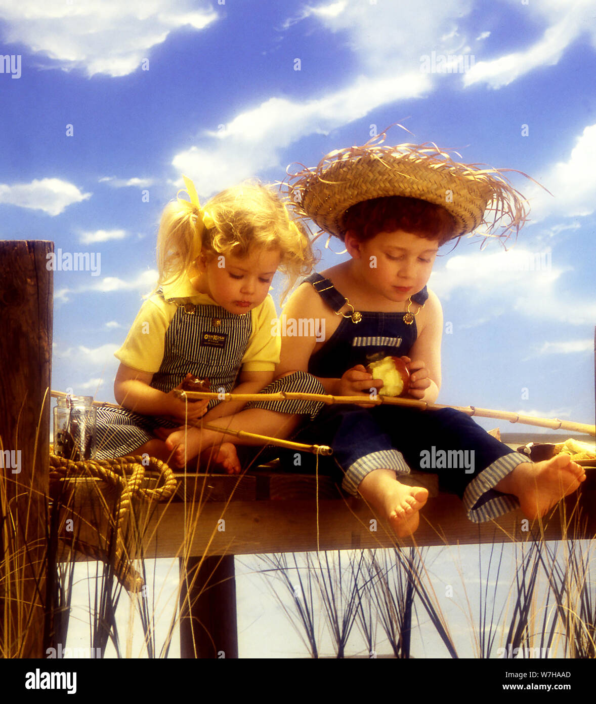 Two boys fishing at dock hi-res stock photography and images - Alamy