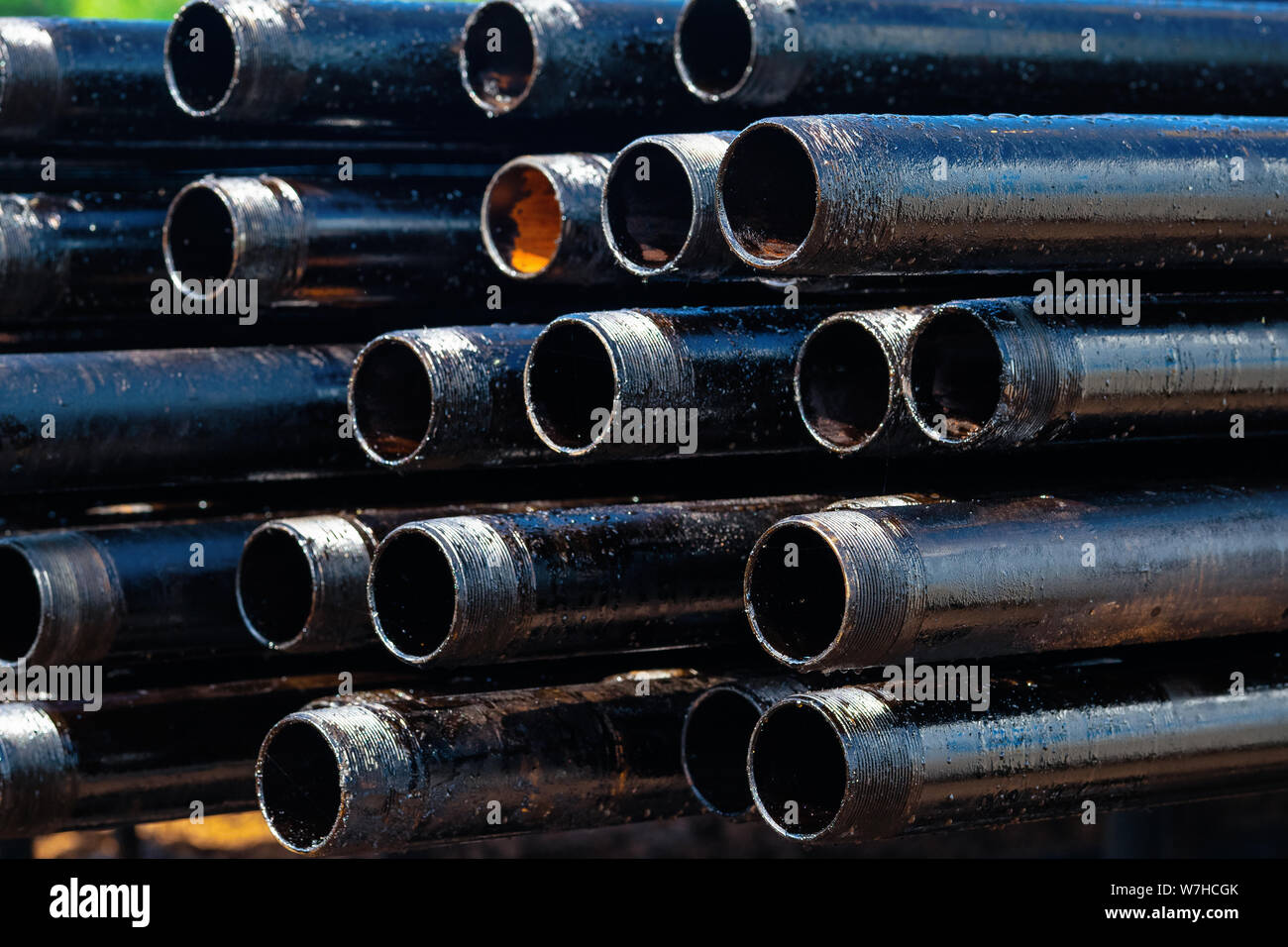 Close up drill pipe thread with pipe dope grease lay down on rig floor