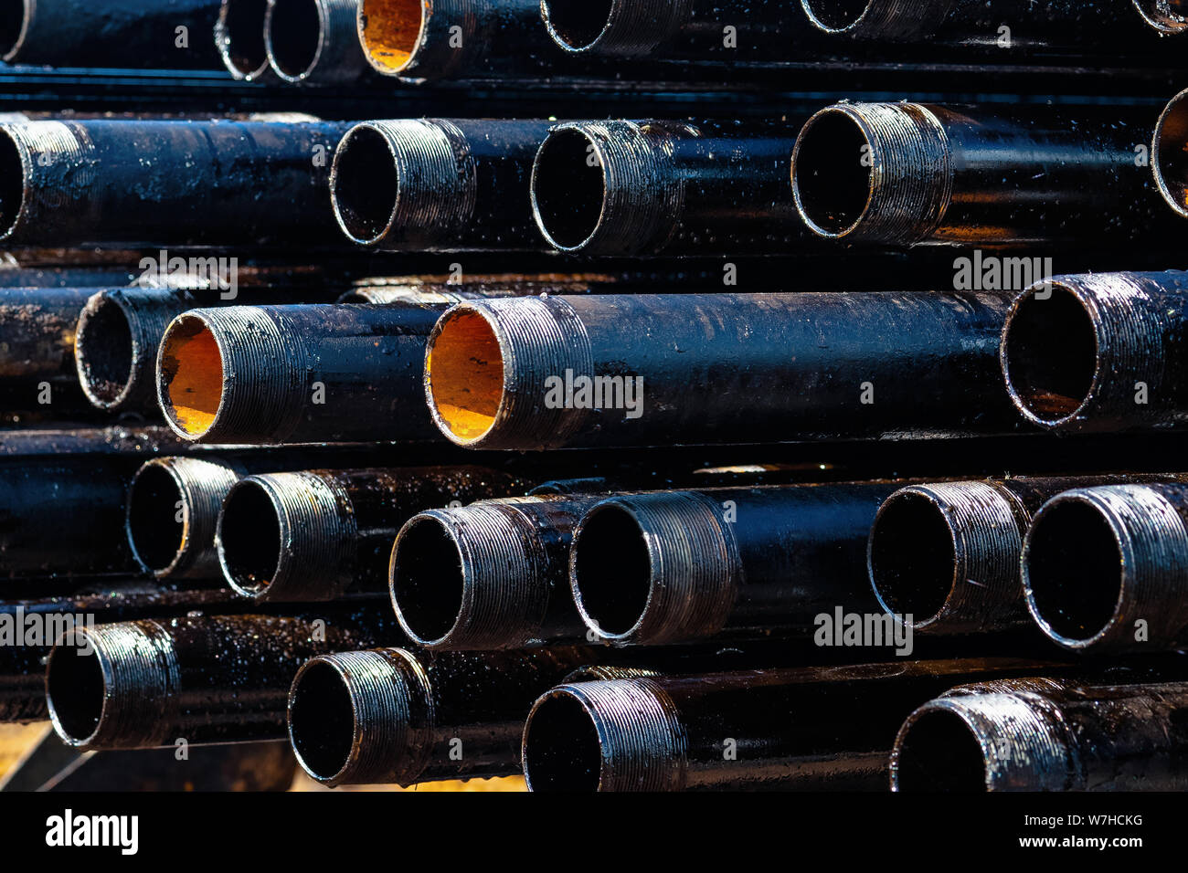 Close up drill pipe thread with pipe dope grease lay down on rig floor