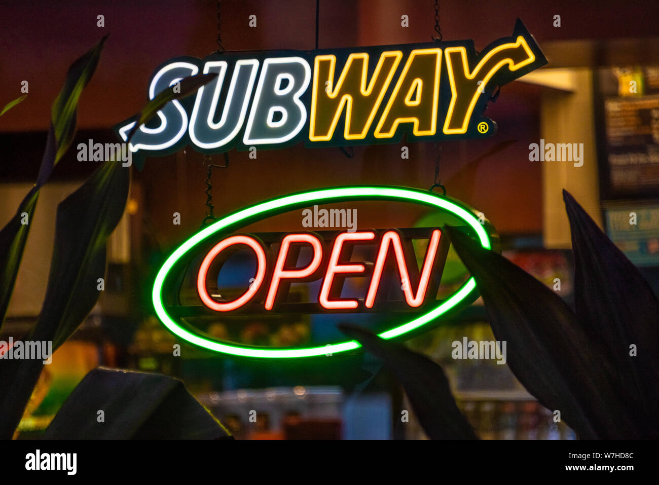 Neon 'Open' sign in the window of a Subway fast food sandwich shop restaurant in West Palm Beach, Florida. (USA) Stock Photo