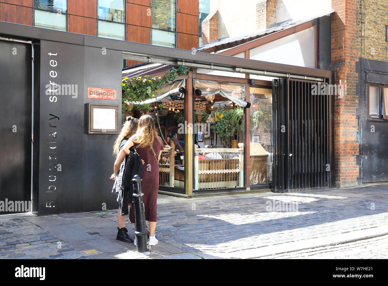 Dishoom Shoreditch, buzzy destination for Indian street food, on Boundary Street, in east London E2, UK Stock Photo