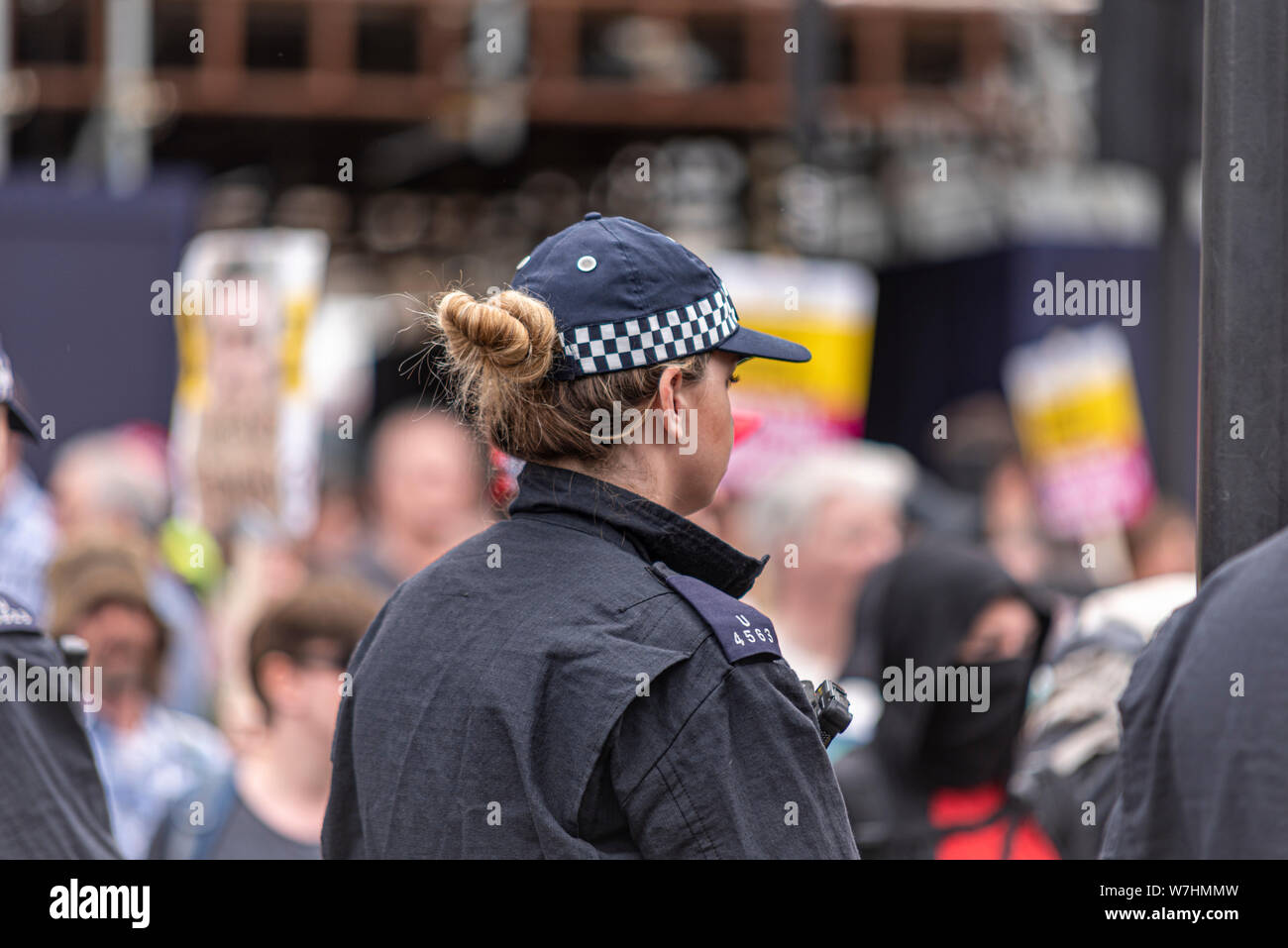 Female police officer at Free Tommy Robinson protest rally In London, UK Stock Photo