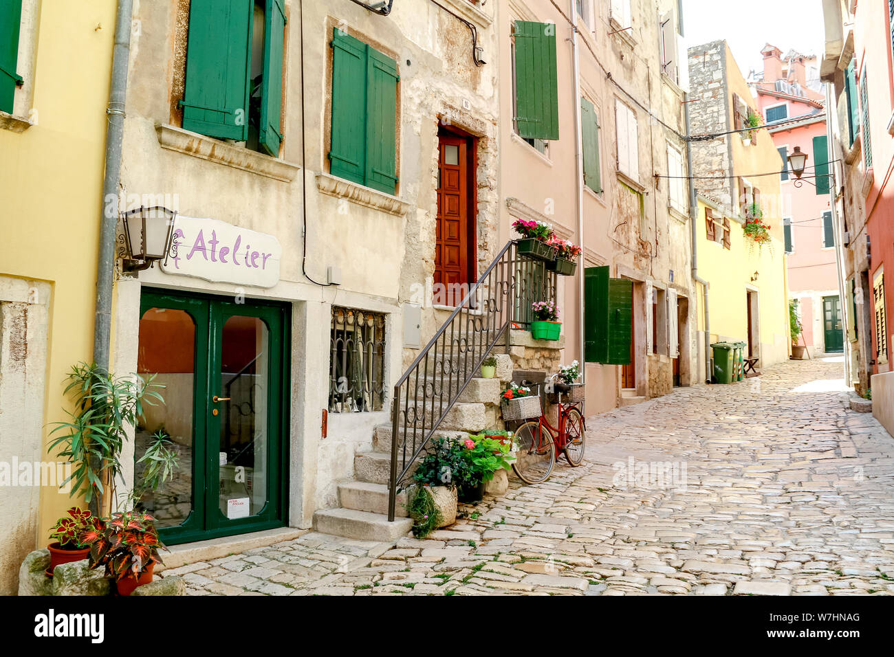 One of the narrow back streets in the historic old town of Rovinj in Croatia Stock Photo