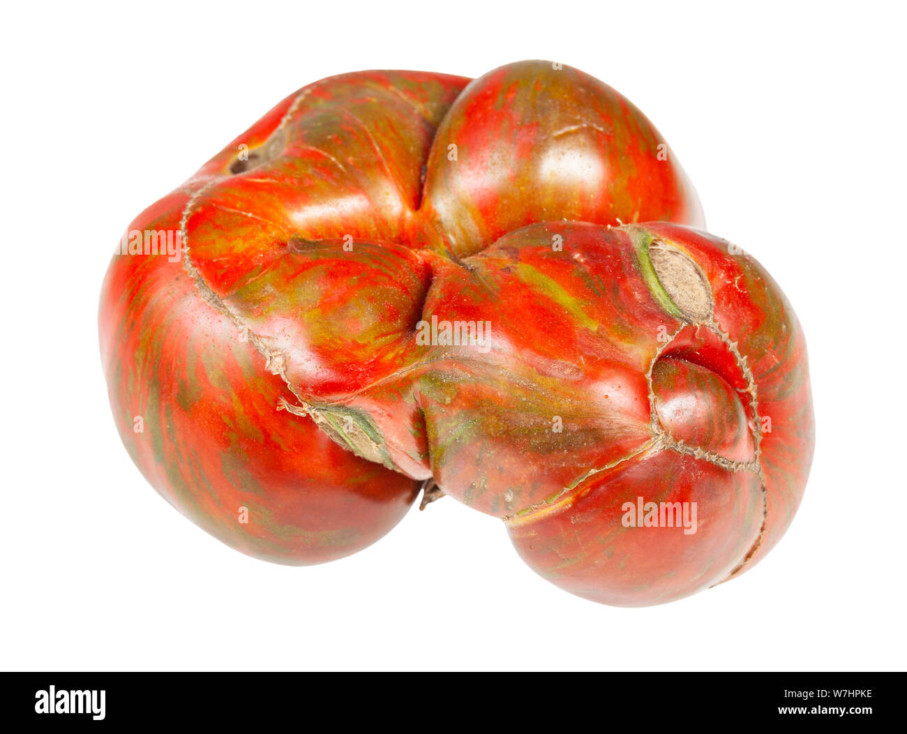 organic large tomato with green veins isolated on white background Stock Photo