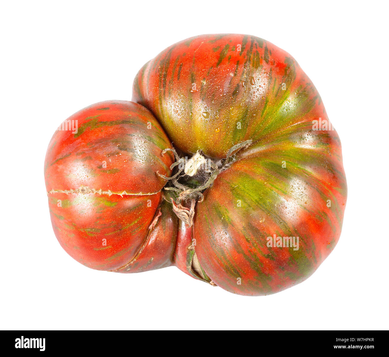 fresh large tomato with green veins isolated on white background Stock Photo