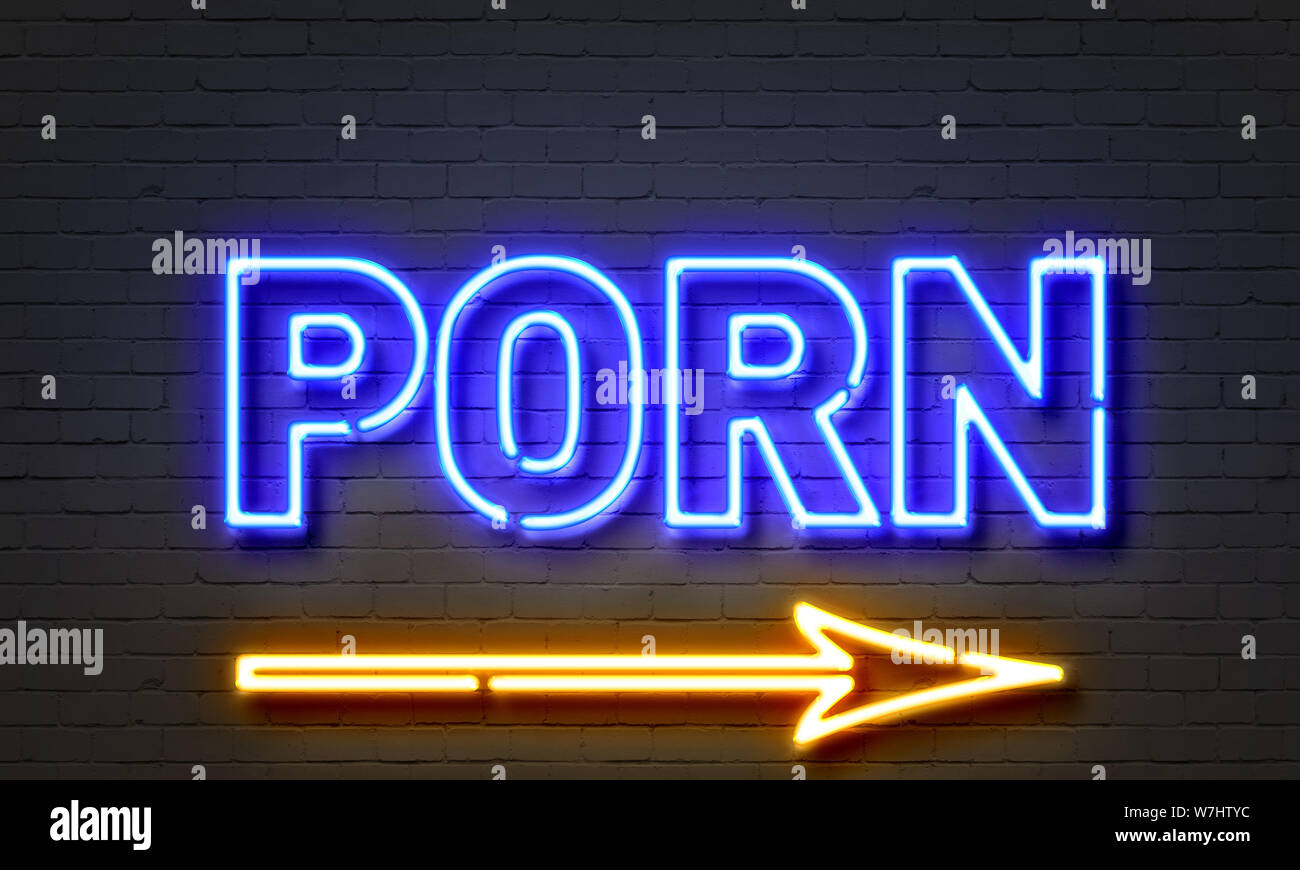 Porn neon sign on brick wall background Stock Photo