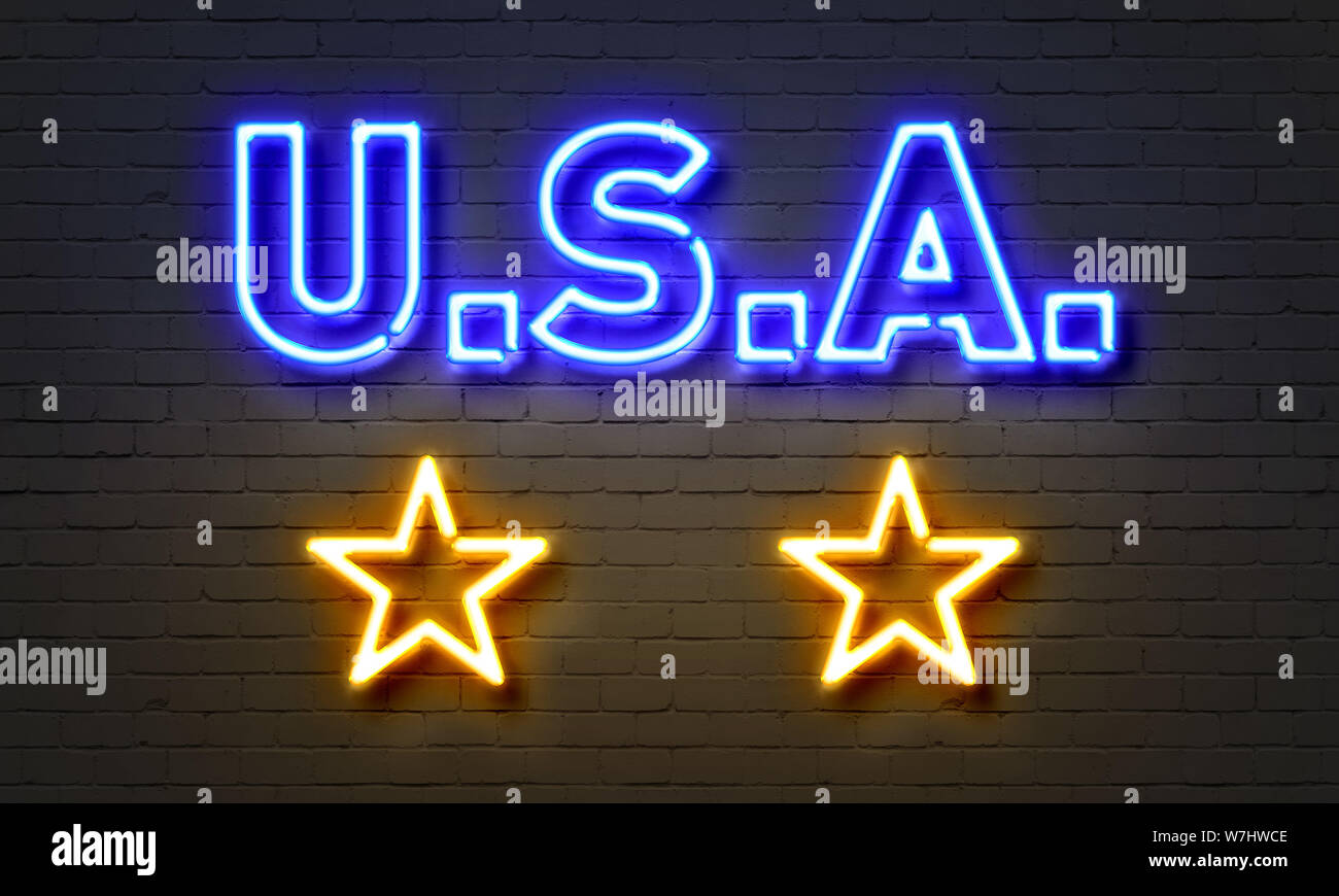 USA neon sign on brick wall background Stock Photo