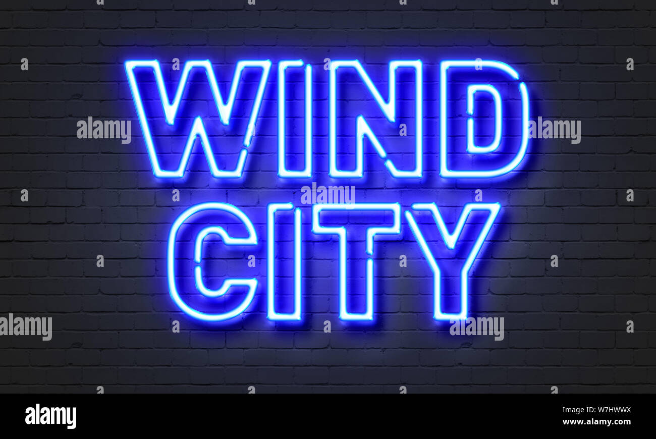 Wind city neon sign on brick wall background Stock Photo