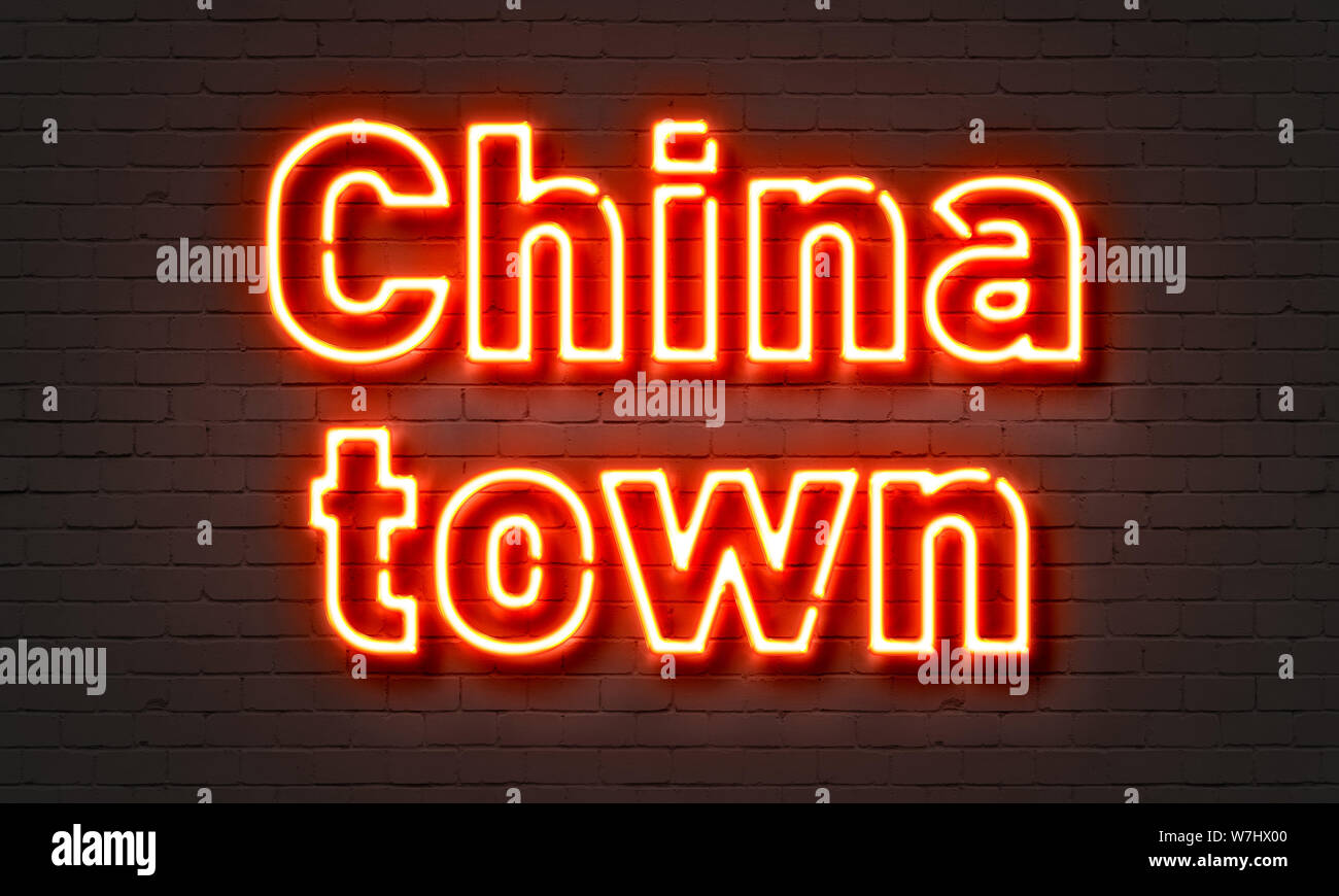 China town neon sign on brick wall background Stock Photo