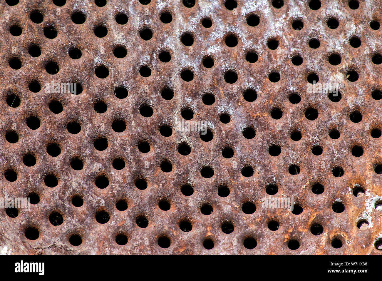 Rusty Perforated Metal Surface Stock Photo