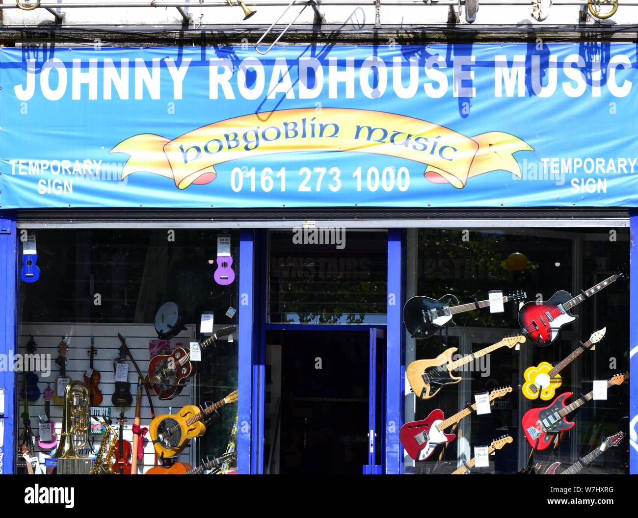 The facade of the family-run, independent Johnny Roadhouse musical instrument shop on Oxford Road, Manchester, uk Stock Photo