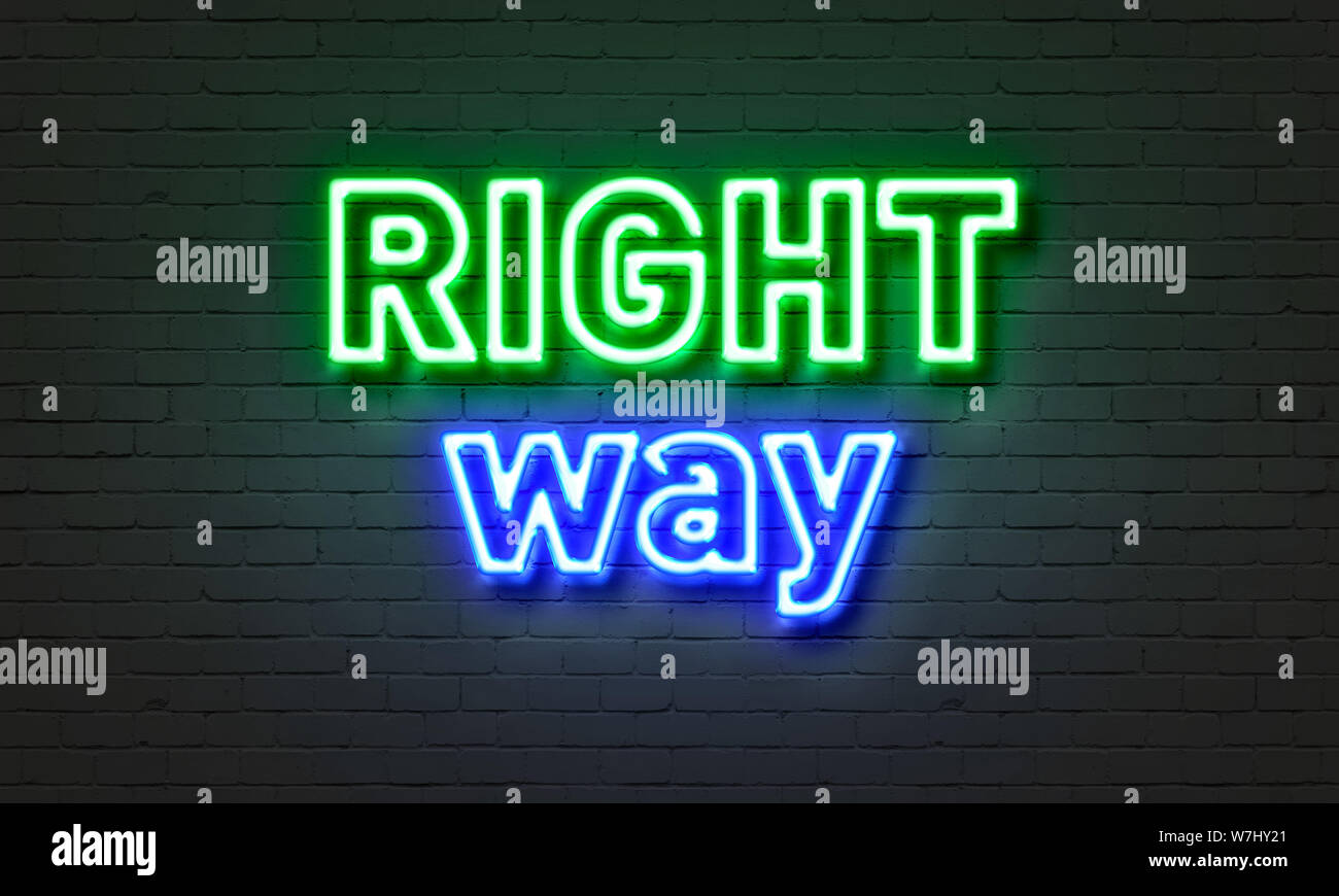 Right way neon sign on brick wall background Stock Photo - Alamy