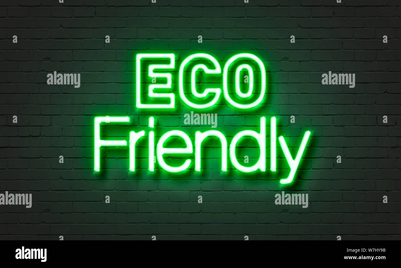 Eco friendly neon sign on brick wall background Stock Photo Alamy
