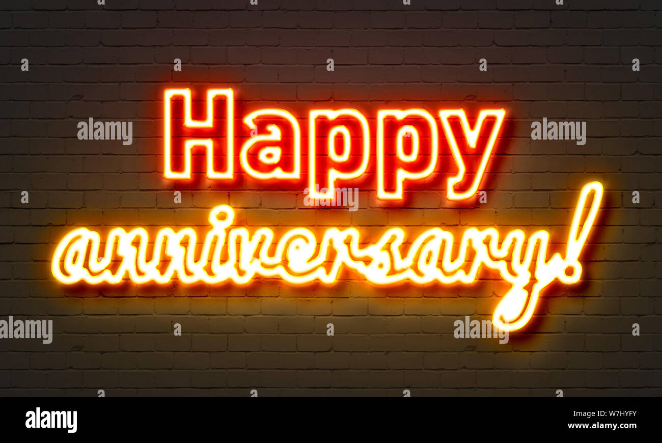 Happy anniversary neon sign on brick wall background Stock Photo - Alamy