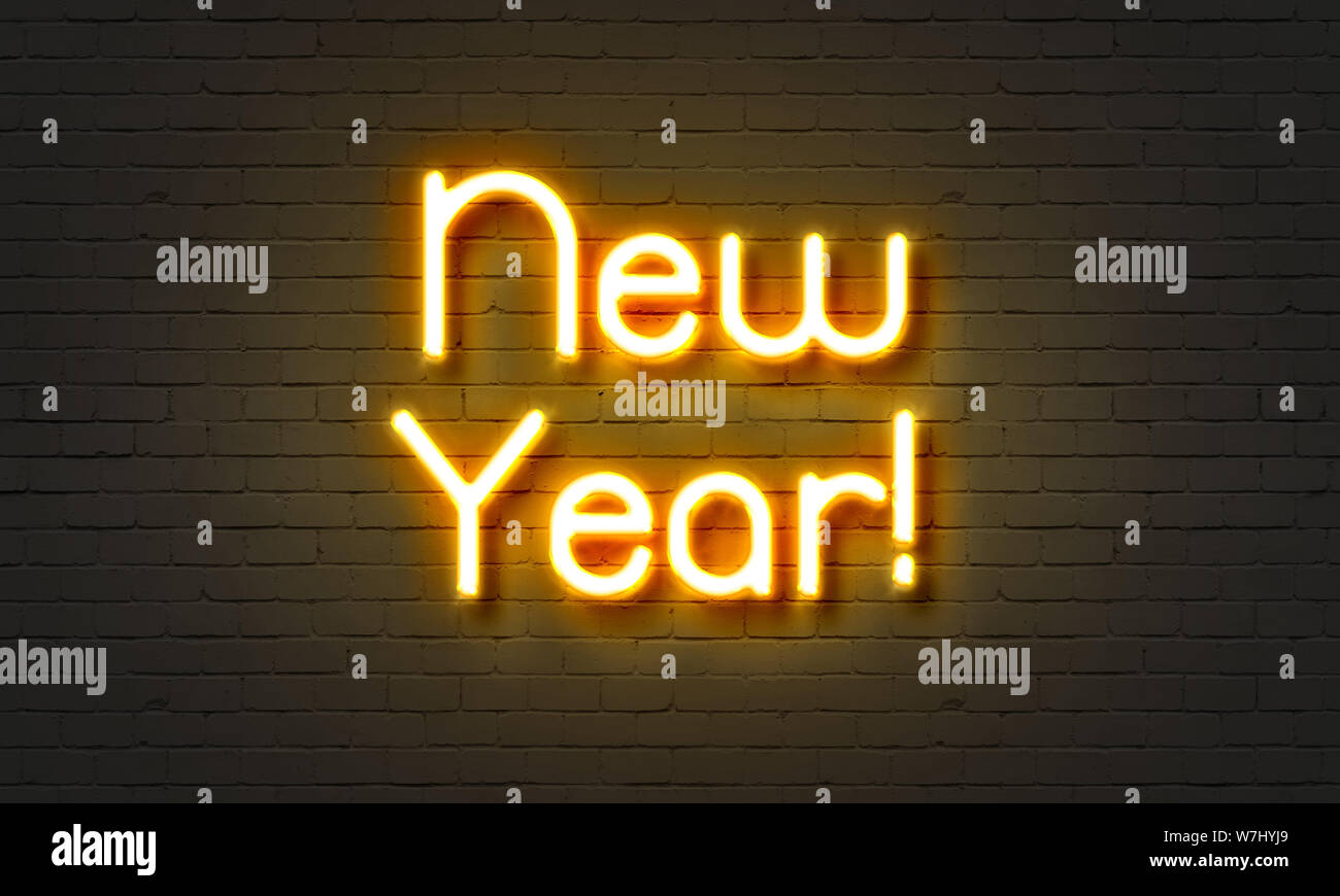 New Year neon sign on brick wall background Stock Photo - Alamy