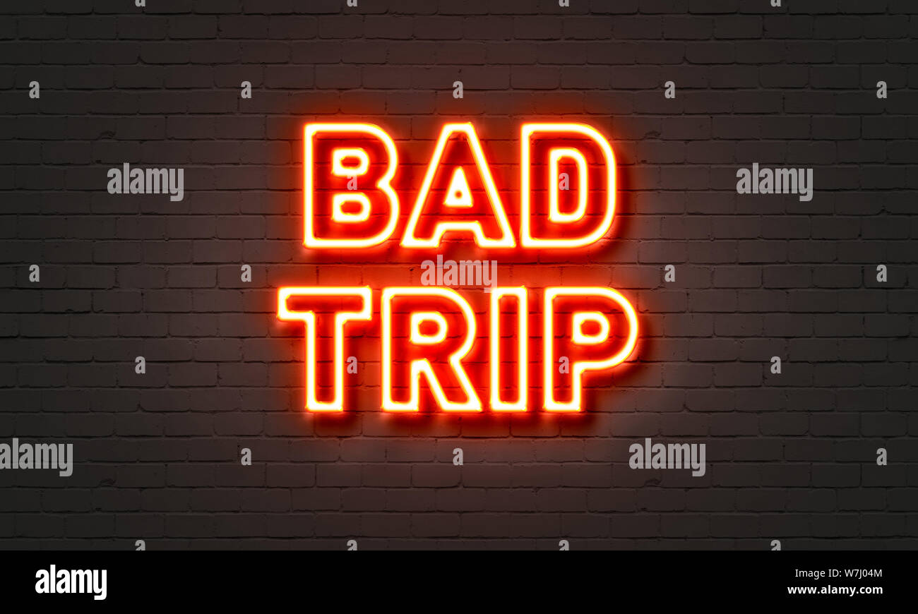 Bad trip neon sign on brick wall background Stock Photo Alamy