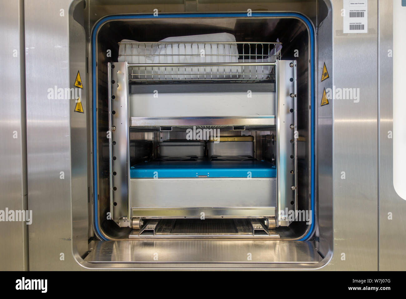 different instrument containers are pushed into a sterilization unit