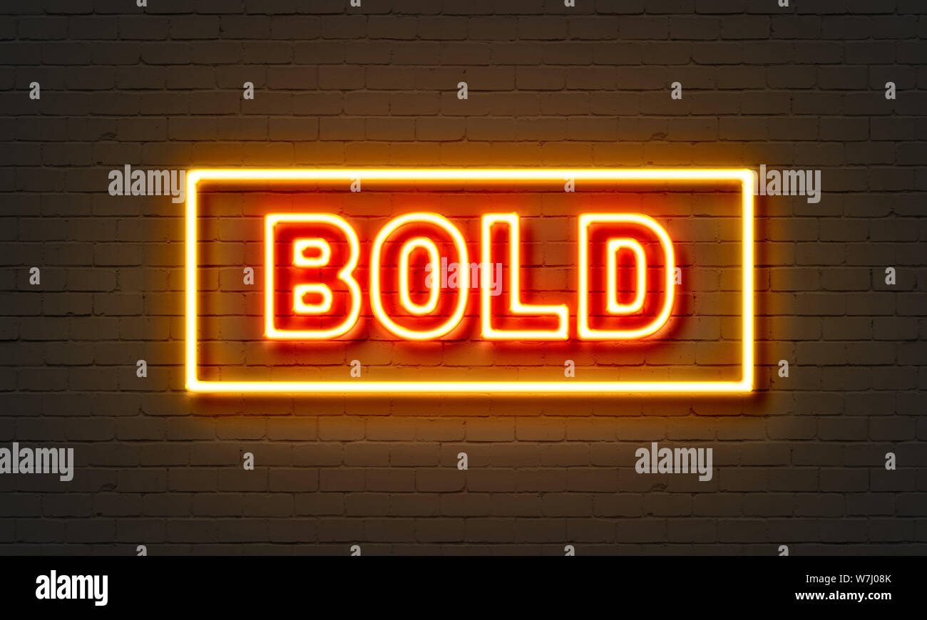 Bold neon sign on brick wall background Stock Photo Alamy