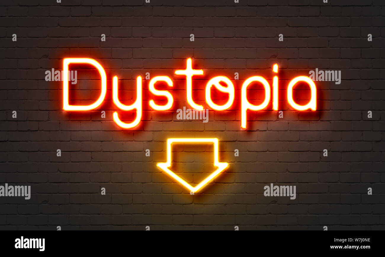 Dystopia neon sign on brick wall background Stock Photo
