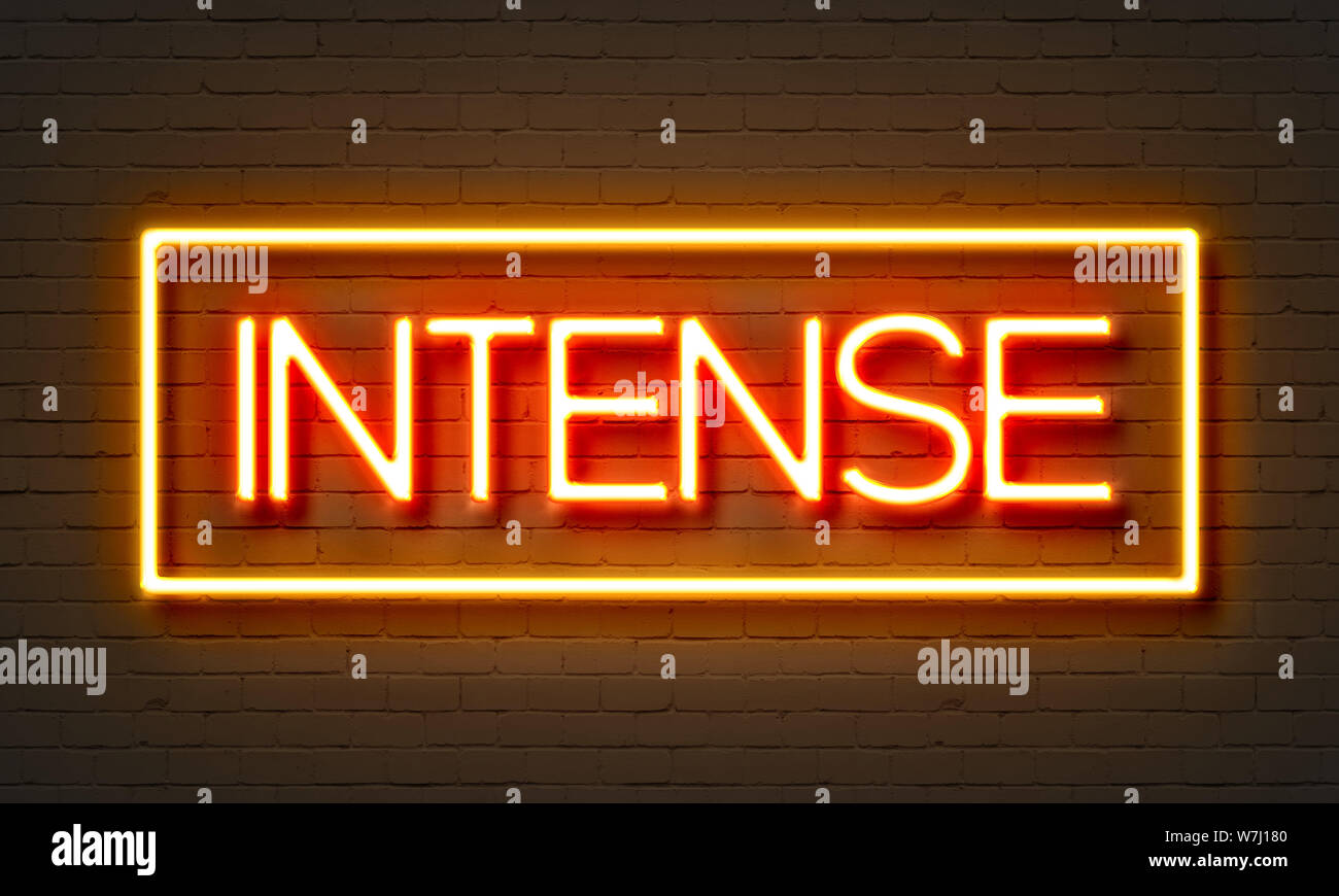 Intensite Sign Intense neon sign on brick wall background Stock Photo - Alamy