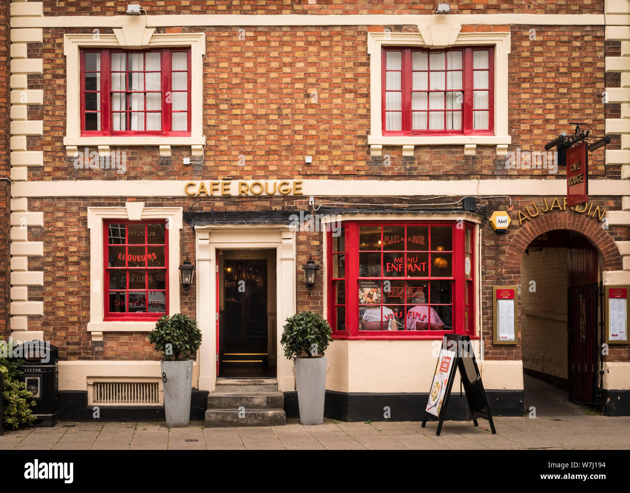 Cafes and restaurants: outside of the Cafe Rouge with an entrance, steps and bay window. Stock Photo