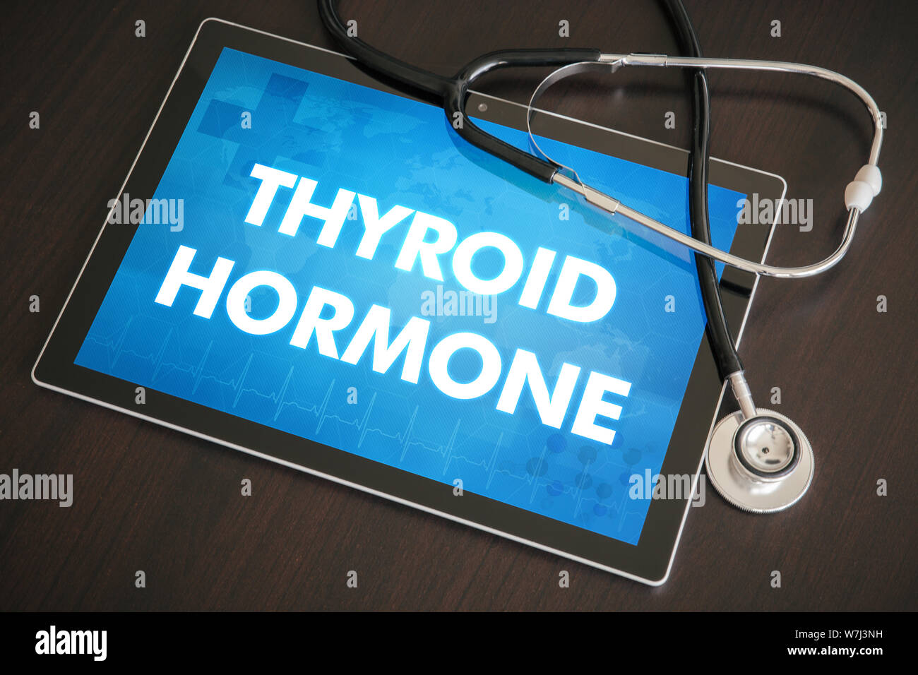 Thyroid hormone (endocrine disease) diagnosis medical concept on tablet screen with stethoscope. Stock Photo