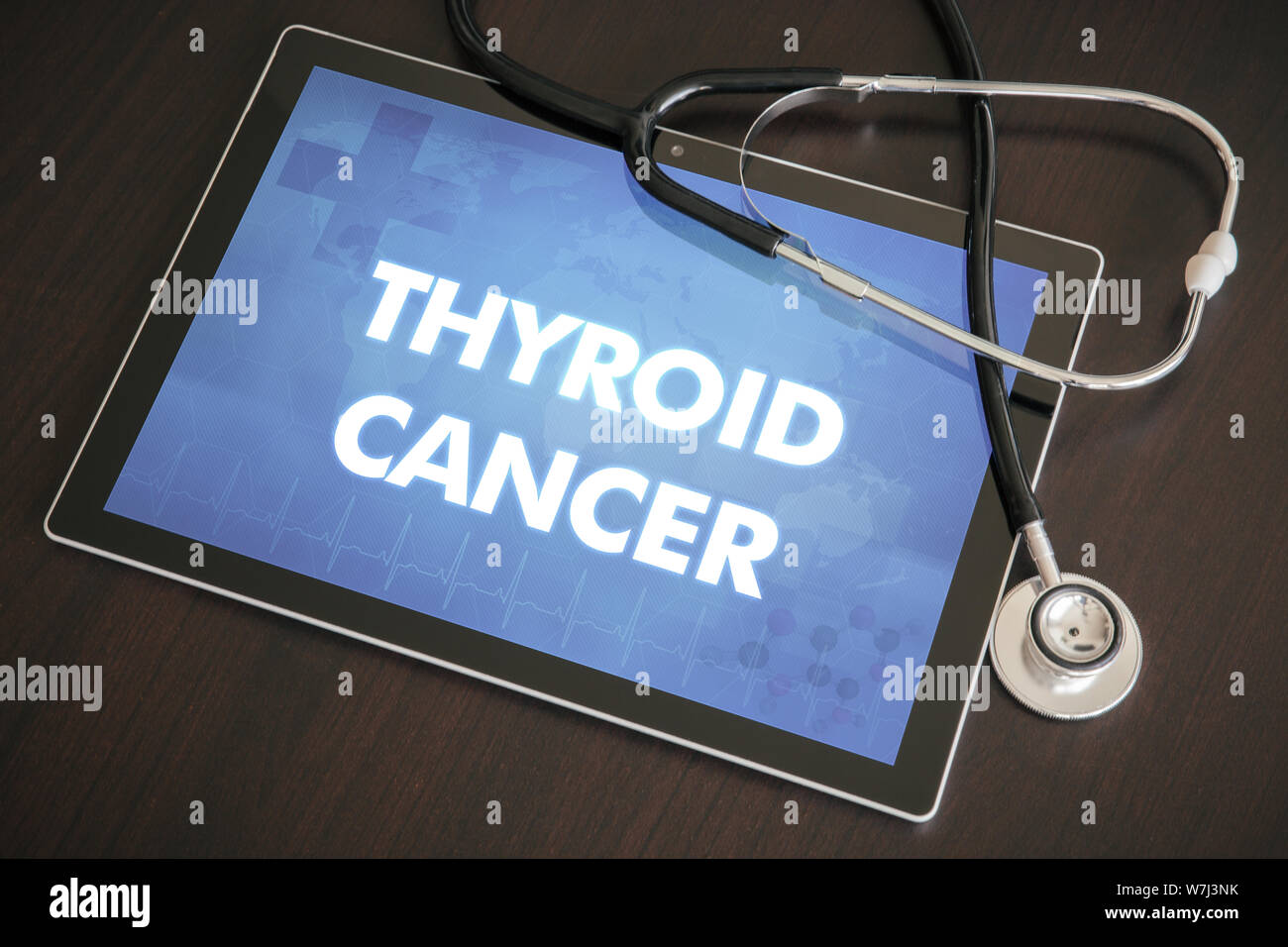 Thyroid cancer (endocrine disease) diagnosis medical concept on tablet screen with stethoscope. Stock Photo