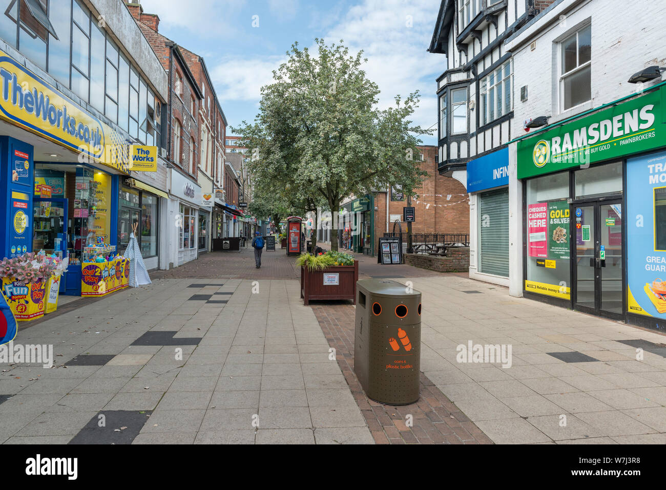 Retail outlets line the edge of George Street in Altrincham town centre ...