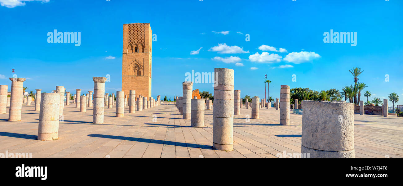 Panoramic landscape with Minaret of Hassan tower, unfinished old mosque in courtyard with stone columns in Rabat. Morocco, Africa Stock Photo