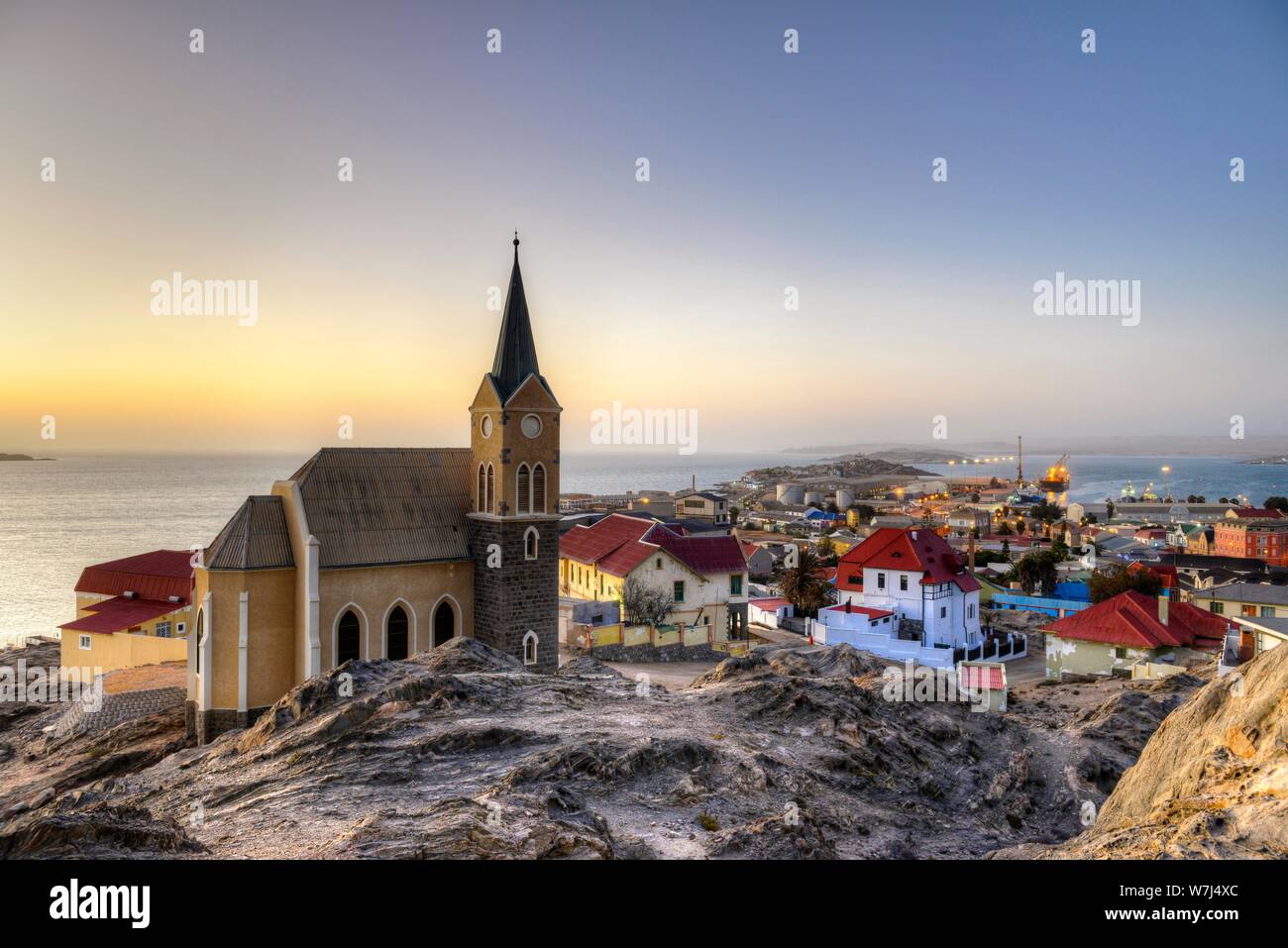 Evening atmosphere above the rock church and the city of Luderitz, Namibia Stock Photo