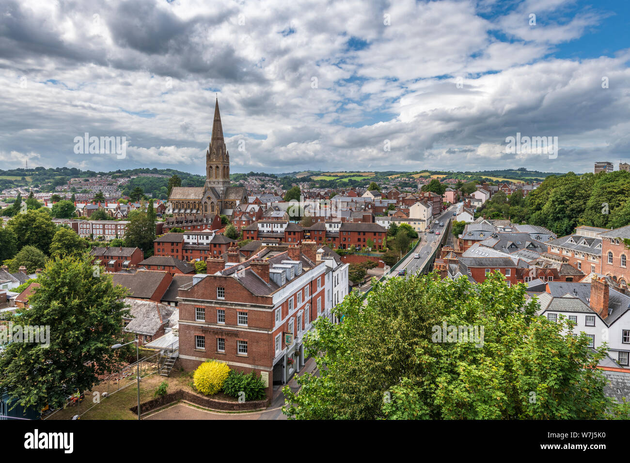 The city of Exeter skyline looking towards the City Gate Hotel and Iron Bridge with St Michael and All Angels Church on the left. Stock Photo