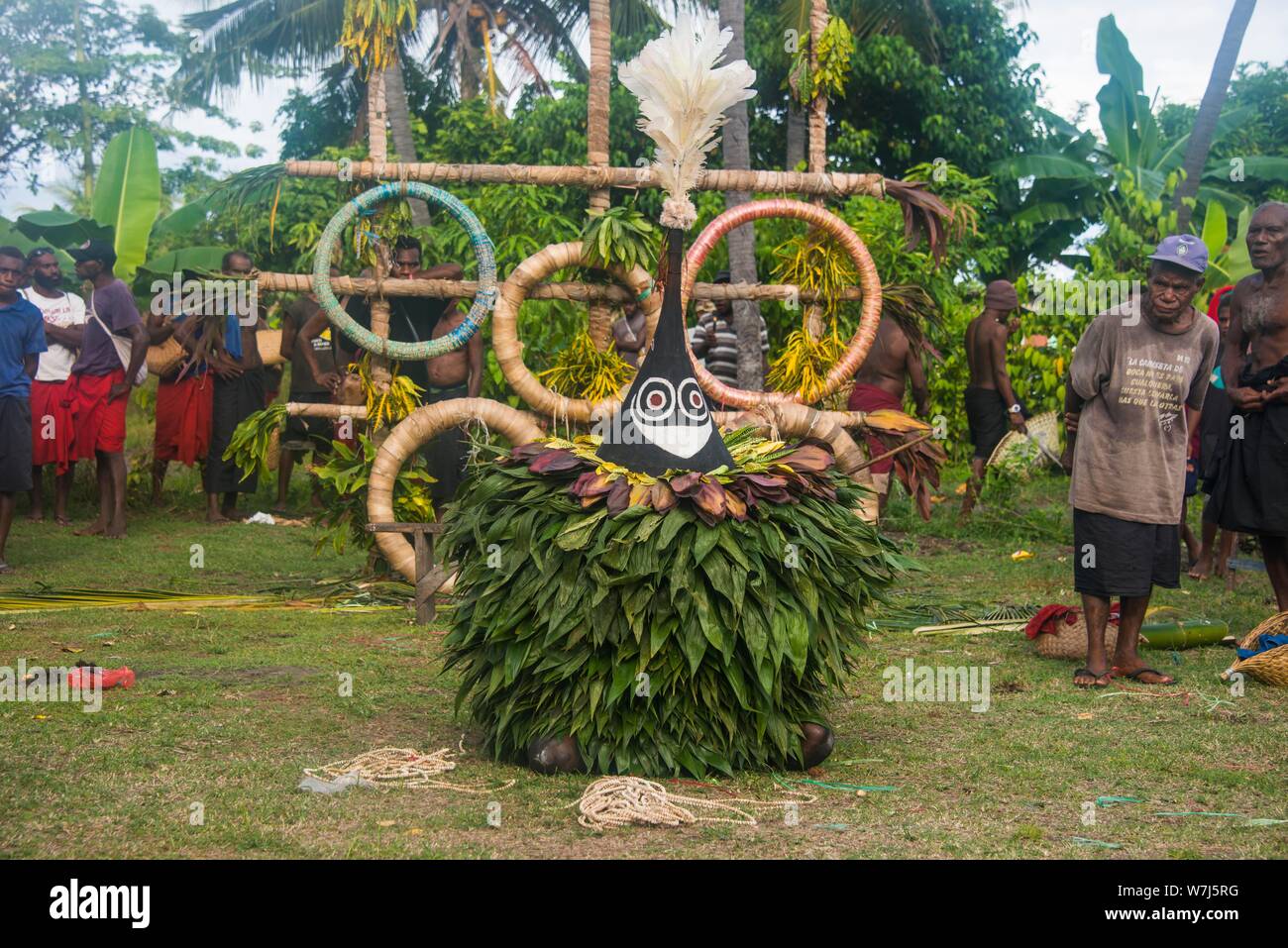 Traditional masked man at a Taboo death ceremony, East New Britain, Papua New Guinea Stock Photo
