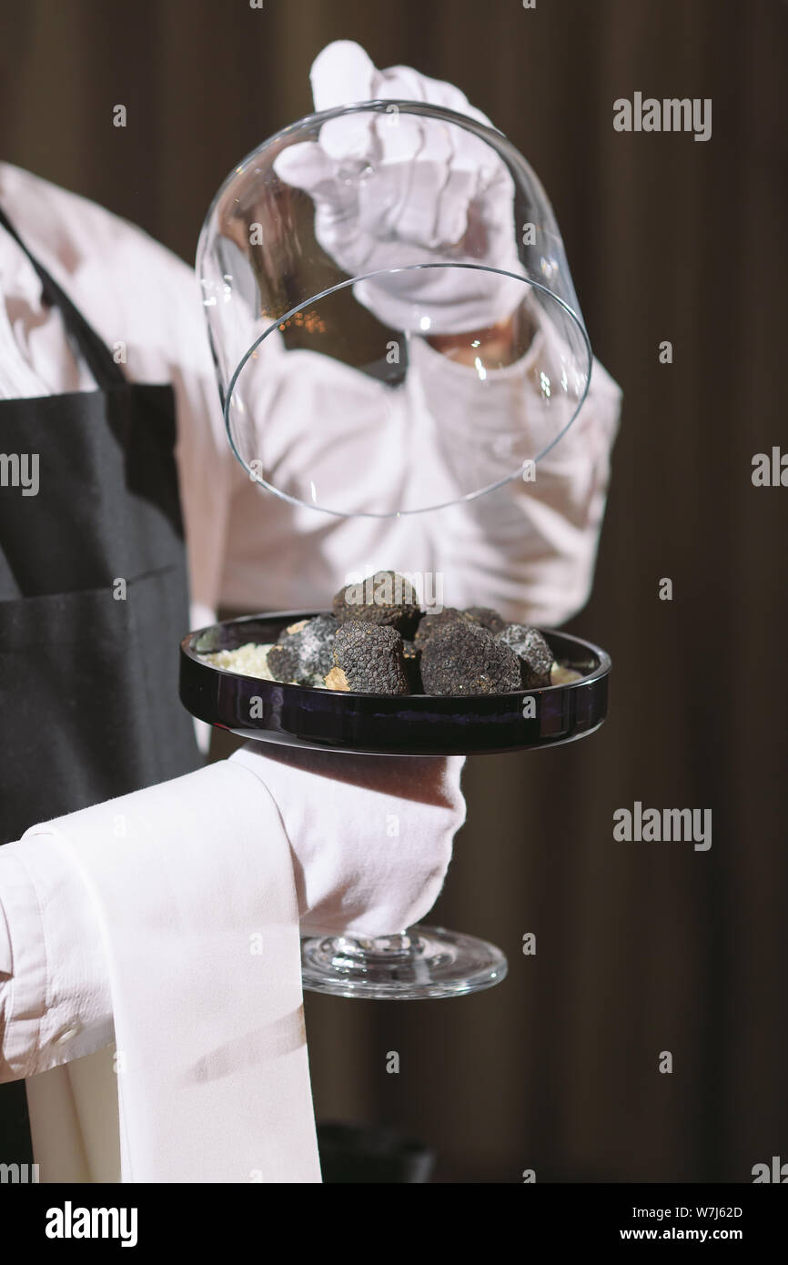 restaurant chef delicacy. truffle vegan food mushroom. waiter service
