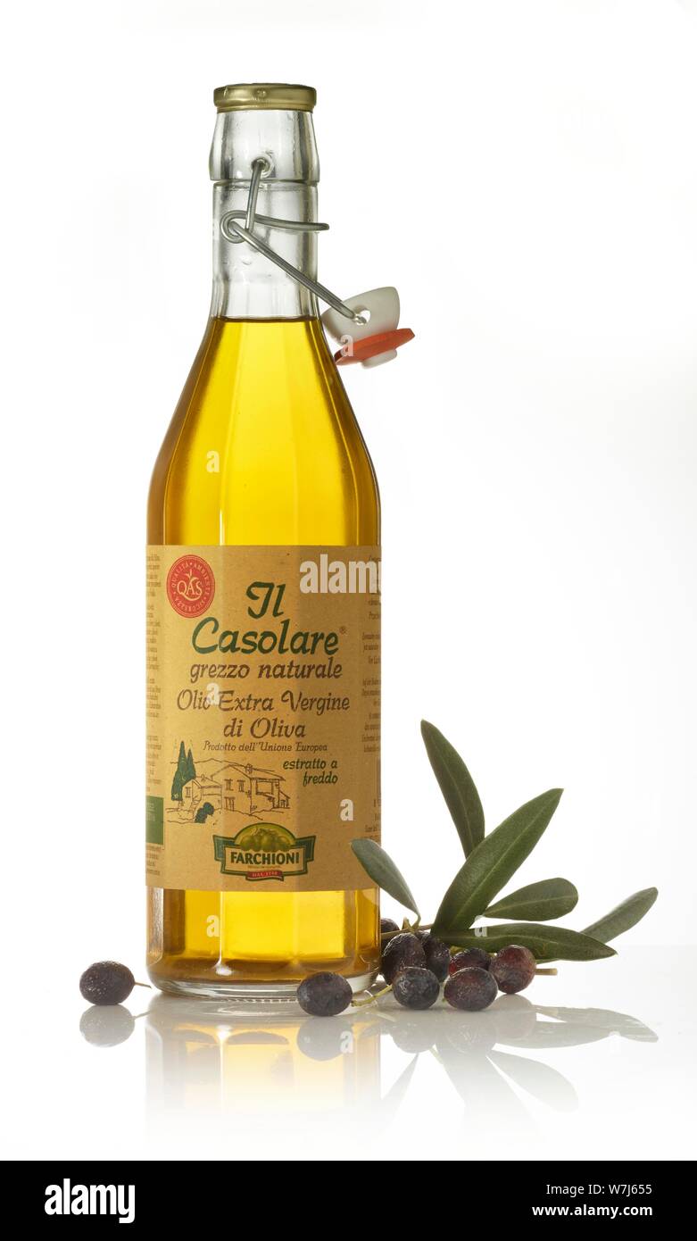 A Bottle Of Olive Oil With Black Olives And Olive Leaves Olea