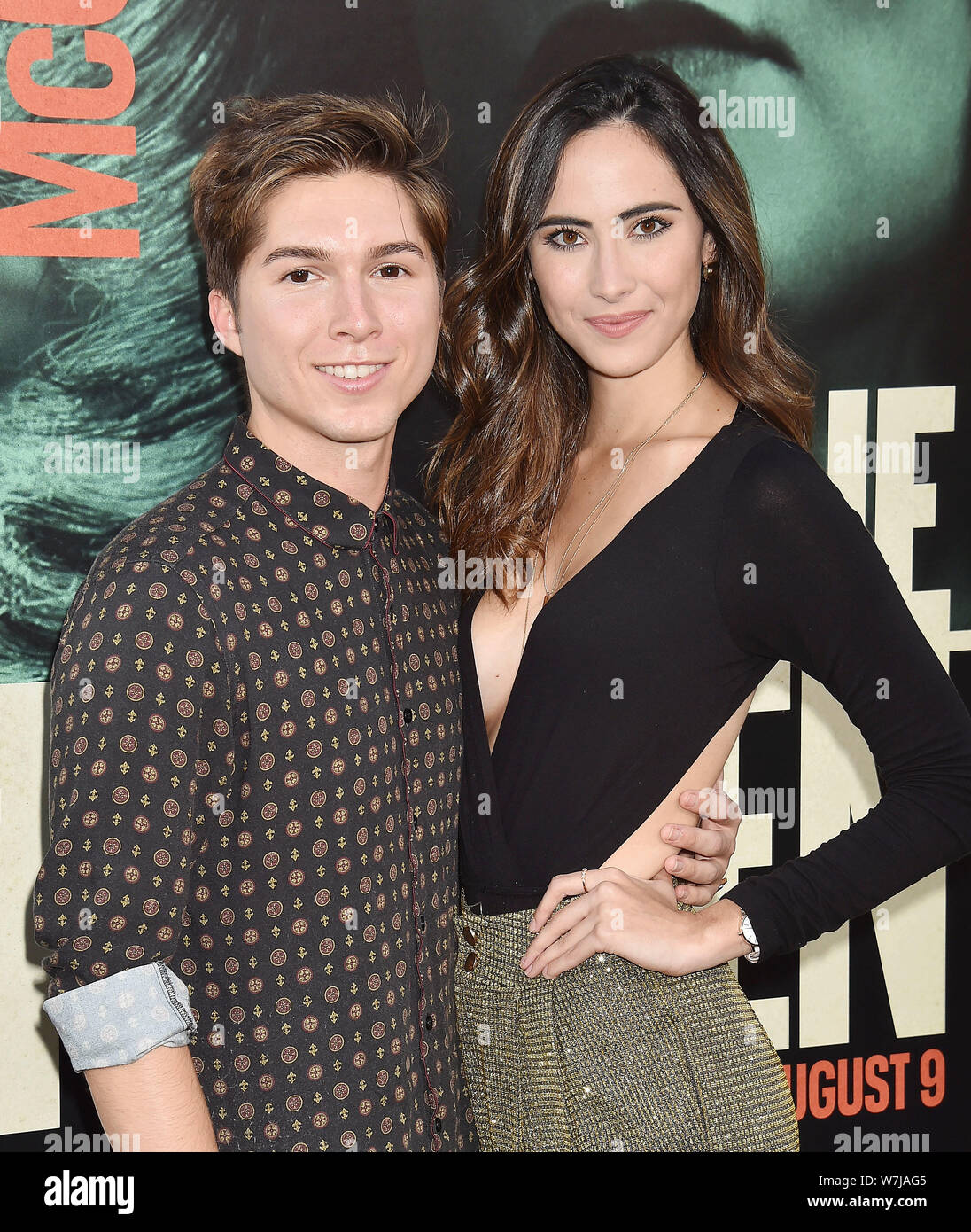 HOLLYWOOD, CA - AUGUST 05: Paul Butcher (L) and Marina Jacoby arrive at the Premiere Of Warner Bros Pictures' 'The Kitchen' Premiere Of Warner Bros Pictures' 'The Kitchen' at TCL Chinese Theatre on August 05, 2019 in Hollywood, California. Stock Photo