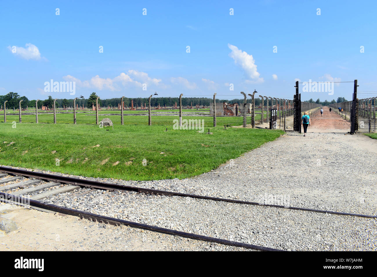 Birkenau/Poland-June 3, 2019: An entrance gate into the demolished accommodation at the Birkenau Concentration Camp in Poland Stock Photo