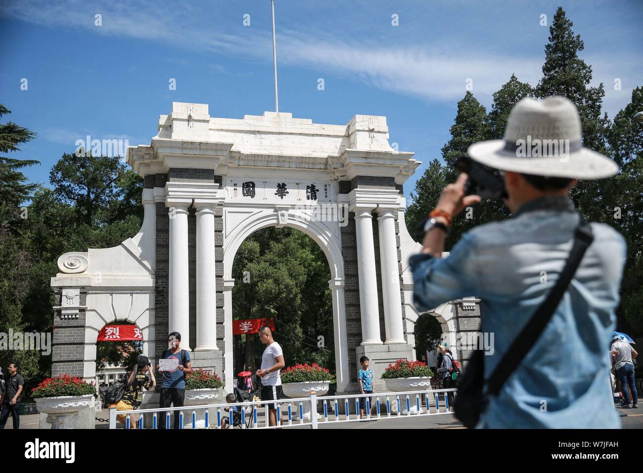 --FILE--A visitor takes photos of the symbolic Second Gate of Tsinghua University in Beijing, China, 25 August 2017.   Chinese authorities on Thursday Stock Photo