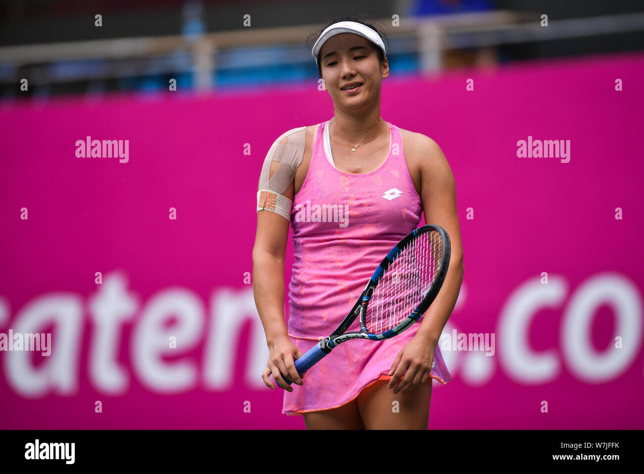 Zhang Kailin of China reacts as she competes against Jana Fett of Croatia  in their first round match during the WTA Guangzhou International Women's  Op Stock Photo - Alamy
